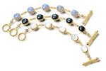 Chalcedony, Black Onyx and Mother of Pearl “Retro Toggle” Suites in Textured 18K Yellow Gold